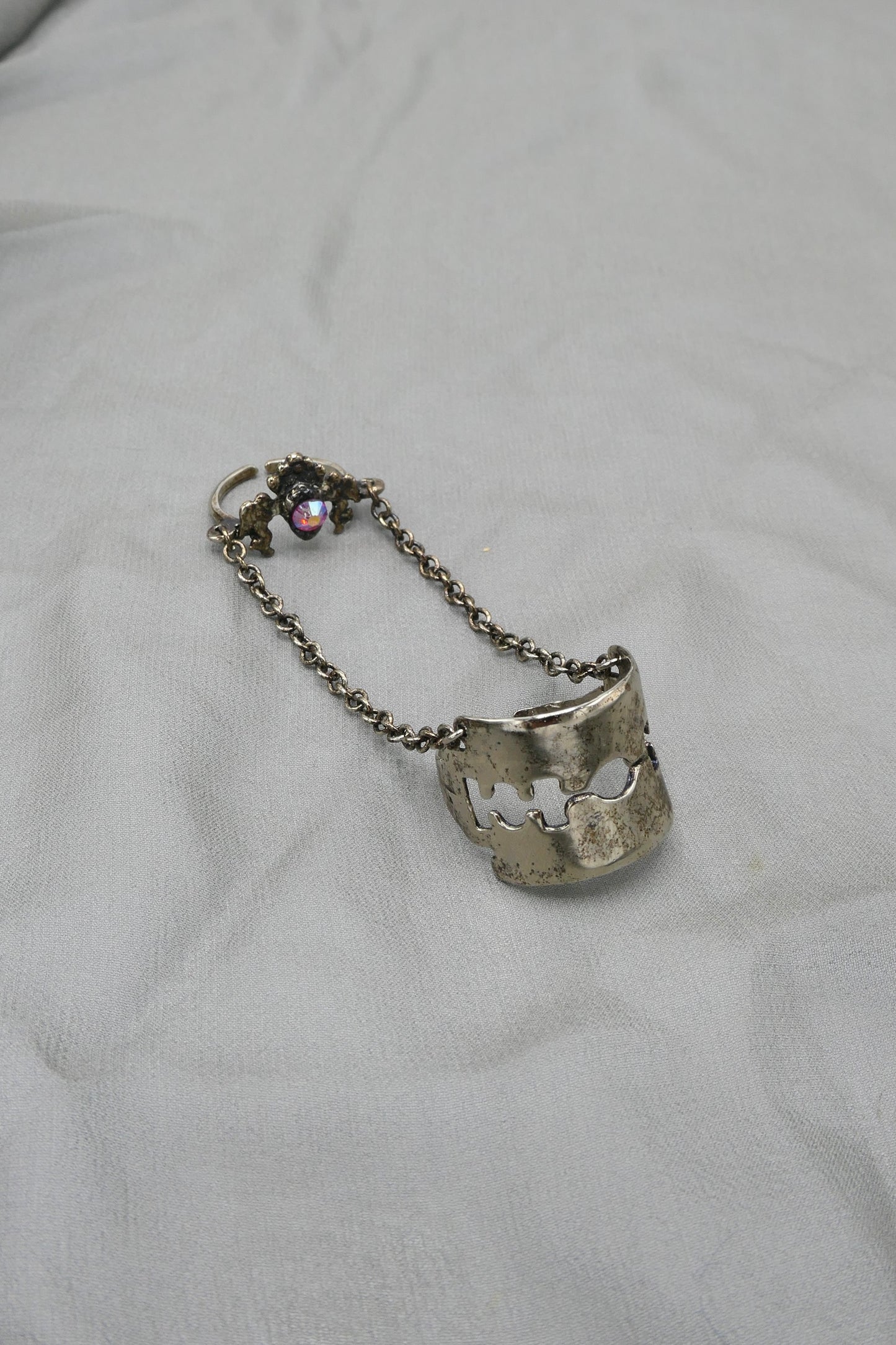 THE RAZOR BLADE AND ANGEL CHAINED RING